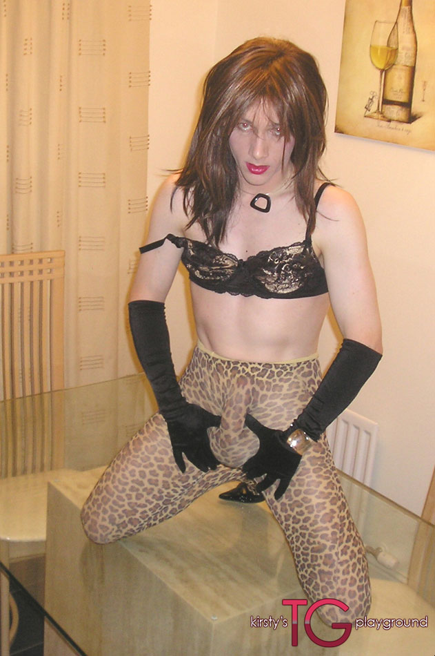 Shemale Stockings Leopard - Horny slut in leopard print pantyhose fucks herself